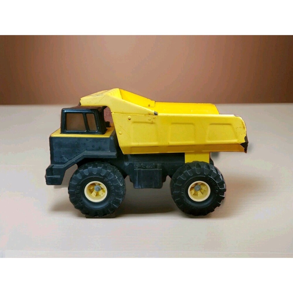 Vintage 1993 Tonka XMB-975 Construction Dump Truck Pressed Steel Yellow Black